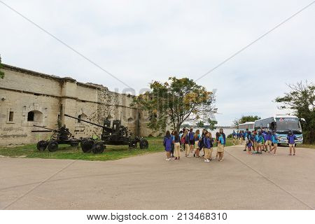A Tour Group Of Teenagers Near The Museum Mikhaylovskaya Coastal Battery — A Fortification On The Co