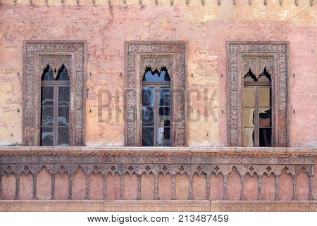MANTUA, ITALY - JUNE 04: Old window in palace on Piazza Sordello The historic city center of  Mantua, Italy on June 04, 2017.