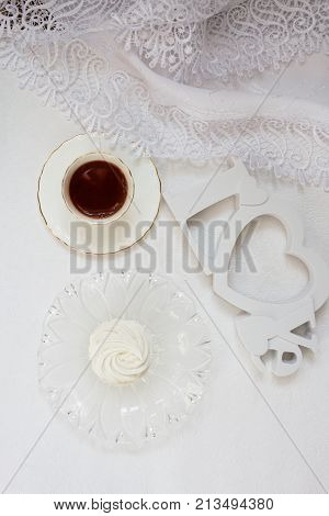 Zephyr cup of coffe. Top view of coffee zephyr on white background