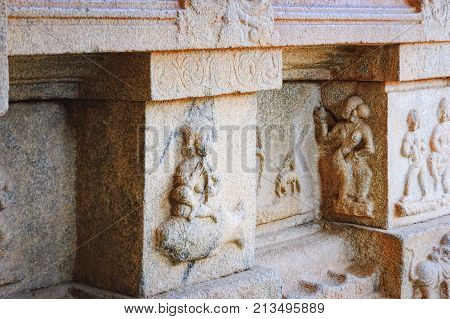 Details of bas relics and panels depicting the story of the epic Ramayana at Hazara Rama Temple in Hampi, Karnataka, India.