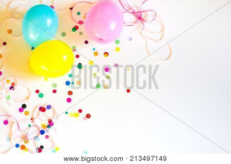 Festive party or carnival confetti on pink background