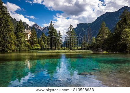 Lake Dobbiaco in the Dolomites, Beautiful Nature Italy natural landscape Alps.