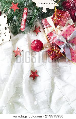 christmas background with gift boxes balls christmas ornaments and christmas tree branches copy space