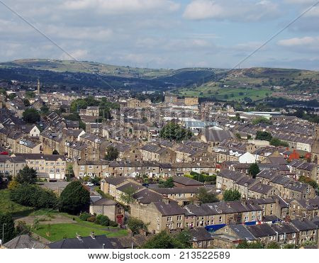 panoramic view of halifx in west yorkshire showing king cross area and pennine hills in the background