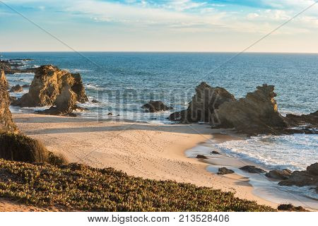 Samouqueira beach with rocks in Porto Covo in Alentejo Portugal.