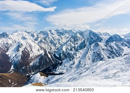 Wonderful mountain landscape in Kyrgyzstan (snow highland peak)