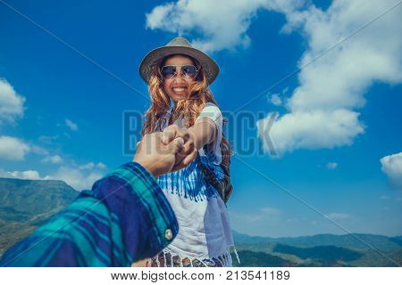 Lover women and men asians travel relax in the holiday. Lovers walk hand in hand nature on the Moutain. Thailand