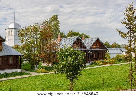 View of old wooden houses in Suzdal city. Russia. Home for nuns in an ancient monastery.