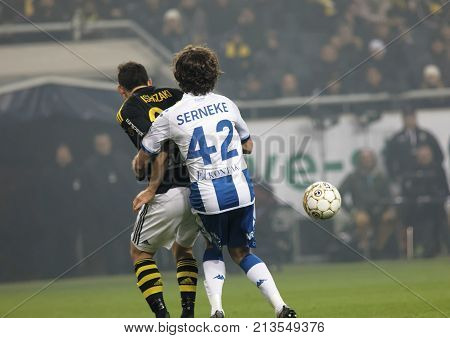 SOLNA SWEDEN - OCT 30 2017: Soccer player Mikkel Diskerud (IFK Goteborg) holding Stefan Ishizaki (AIK). October 30 2017SolnaSweden
