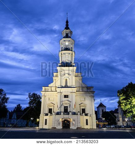 Kaunas, Lithuania - August 22, 2017: Evening view on the ancient beautiful Town Hall of Kaunas, Kaunas Lithuania. The structure dates from the 16th century. It houses a Museum of Ceramics.