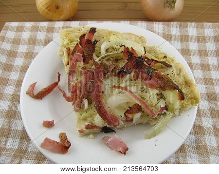 Fresh baked tarte flambee on a plate