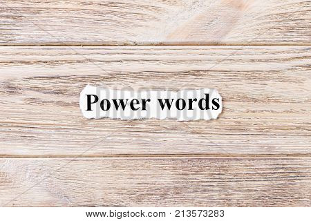 power of words of the word on paper. concept. Words of power of words on a wooden background.