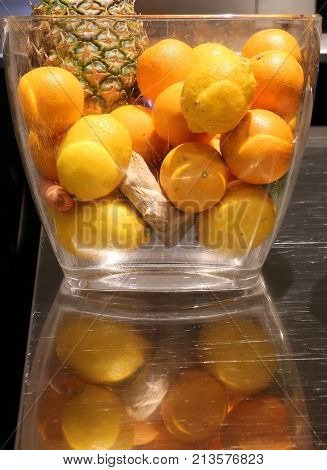 Vase With Pineapple Lemons Oranges