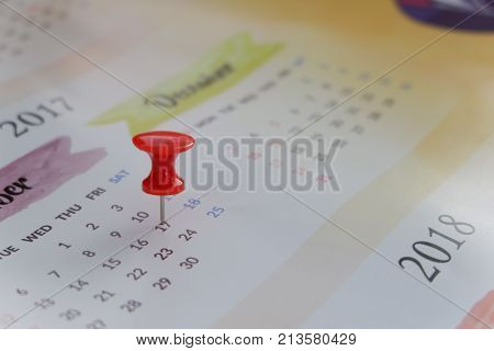 Calendar with red pin for planning concept for business