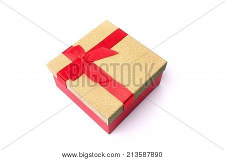 Christmas gift with a red bow  isolated on white background