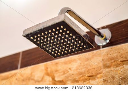 Hard water calcium deposit and corrosion on chrome shower tap