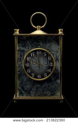 vintage massive desk clock in a block of gray stone (magnesite) with brass details on a black background