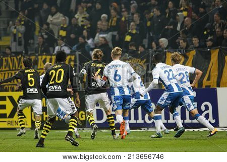 SOLNA SWEDEN - OCT 30 2017: Soccer player fighting to get the ball in the game AIK and IFK Gothenburg. October 30 2017SolnaSweden