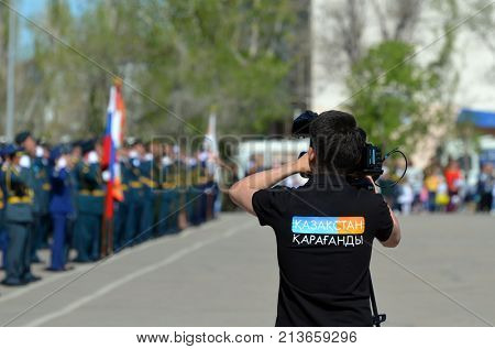TV Karaganda chanel operator.Kazakhstan army parade.V-day celebration.Sary Shagan.Former Soviet anti-ballistic missile testing range.West Bank of Balkhash lake .May 9, 2017.Priozersk.Kazakhstan

