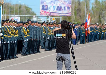 TV Karaganda chanel operator.Kazakhstan army parade.V-day celebration.Sary Shagan.Former Soviet anti-ballistic missile testing range.West Bank of Balkhash lake .May 9, 2017.Priozersk.Kazakhstan

