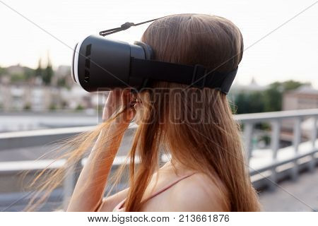 Amazed Young Beautiful Girl Using New Vr Technology