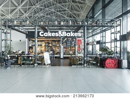 ZAGREB AIRPORT - 24 APRIL 2017: Bakery and coffee shop with passengers.