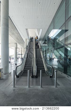 ZAGREB AIRPORT - 24 APRIL 2017: Passengers on escalators at Franjo Tudjman airport