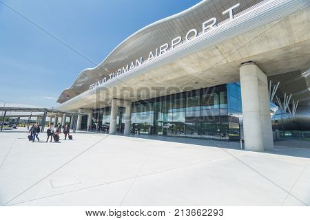 ZAGREB AIRPORT - 24 APRIL 2017: Travellers exiting Franjo Tudjman airport.