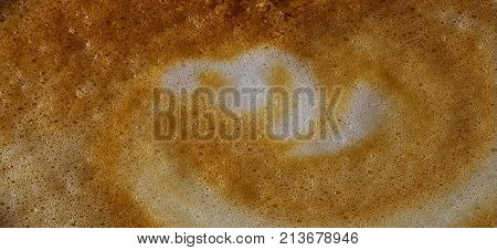 Abstract Coffee foam closeup. Background with space for text .