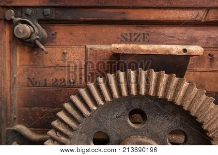 Closeup of gear on machinery in old factory