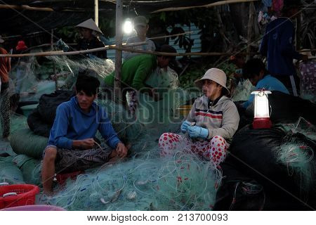 People Working On Beach At Early Morning