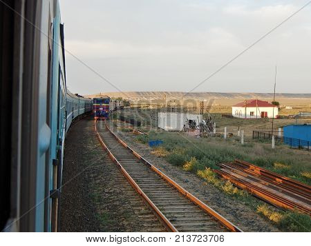 Railway crossing. Mangistau region. Kazakhstan. Path Mangyshlak - Shetpe