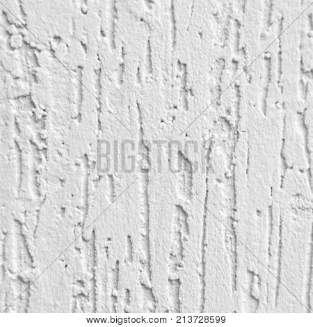 the background is made of a texture of Venetian plaster of white color. Style bark beetle with a relief surface