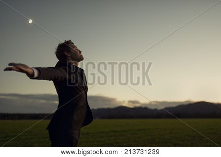 Businessman Celebrating The Tranquility Of Nature