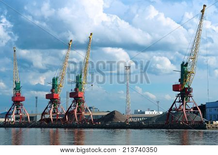 Seaport on the Baltic sea. Сommercial port. Port cranes and machinery. Baltic sea Kaliningrad