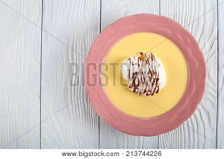 Floating Island Dessert  In A Pink Plate