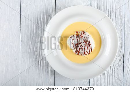 A Floating Island Dessert In Plate