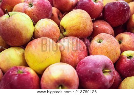 Fresh Raw Lot Of Green Red Apples On Counter