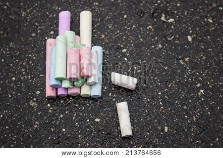 A Drawing with chalks asphalt colored crayons