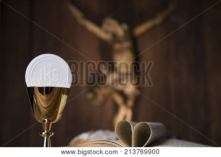 Eucharist symbol of bread and wine, chalice and host, First communion background