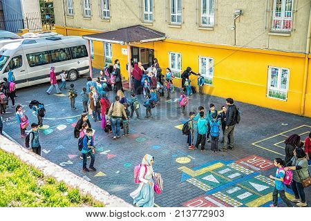 ISTANBUL TURKEY: Cortyard of primary school Firuzaga in Beyoglu district children with their parents on October 6 2017