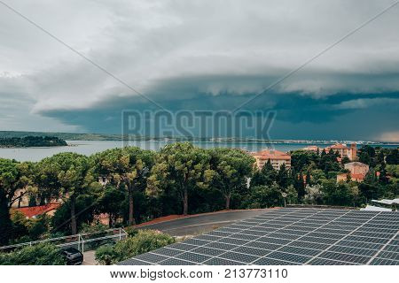 Stormy clouds over the Portoroz a small town at Slovenian coastline at Adriatic sea