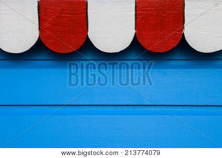 Blue wood background with white and red top banner