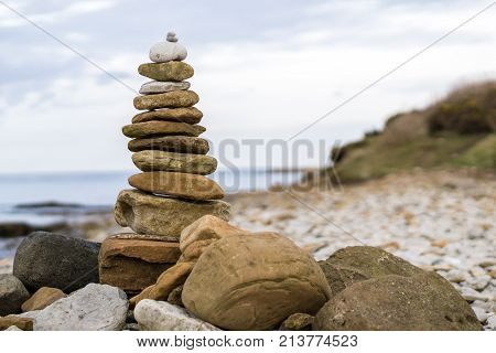 Tower of stones on the coast, calm look