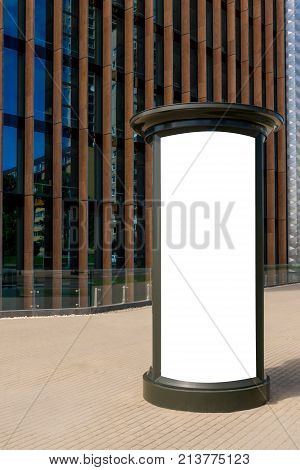 Advertising column mockup. Blank billboard outdoors, outdoor advertising, public information board in the city.