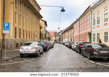 Sibiu Romania October 07 2017 : Timotei Popovich street in a rainy day in Sibiu city in Romania