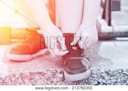Ready to sport concept Fat women tide her shoues for go exercise healthy diet