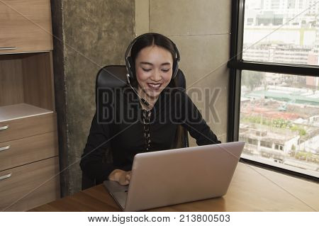 Callcenter is answering the phone customer question.