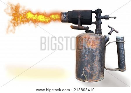 Old gasoline blowtorch on a white background. Insulated blowtorch