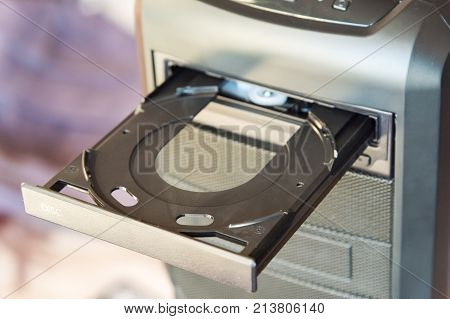 PC case with built-in DVD drive with an open blank disc tray